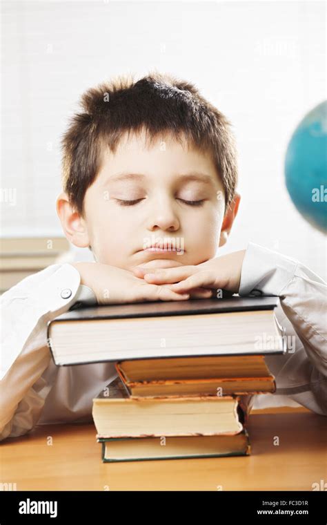 Bored Caucasian Boy In Classroom Stock Photo Alamy