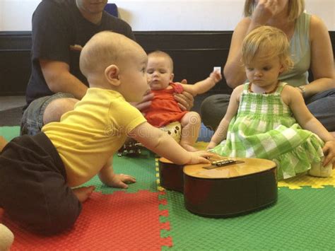 Babies In Music Class Crawl To Guitar Editorial Stock Photo Image Of