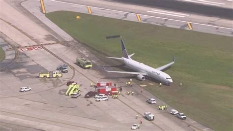 Plane Skids Off The Runway At Iah