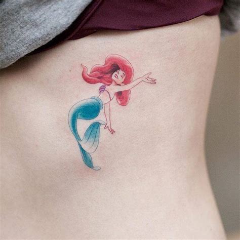 Ariel the little mermaid tattoo on the left side