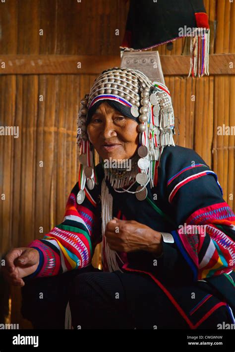 Woman Of The Akha Tribe Wears Elaborate Headdresses Made Of Beads