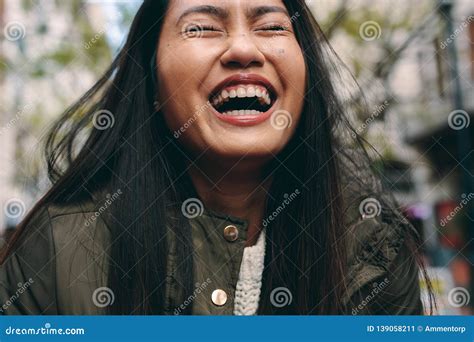 Close Up Of An Asian Woman Laughing Stock Image Image Of Standing