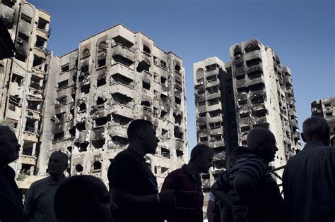 City Of Devastation Syrians Return To Hellish Scenes In Homs Time