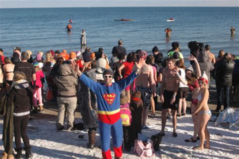 Eight Hundred Canadians Kick Off New Year At Largest Charity Polar Bear Dip