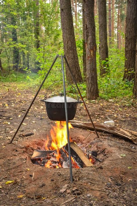 Cooking In Pot On Campfire Camp Cooking Pot With Hot Food Stock Photo