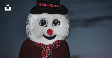 Person Wearing Snowman Mascot Photo Free Snowman Image On Unsplash