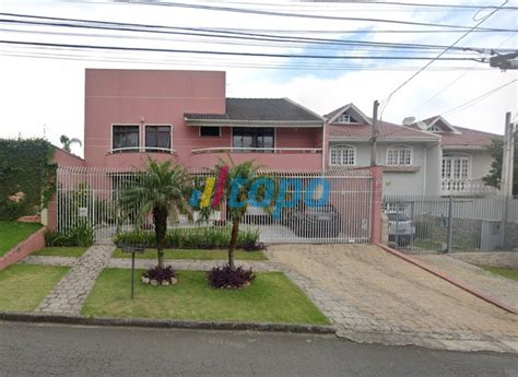 Topo Leilões Casa Rua Dona Saza Lattes nº 676 bairro Uberaba