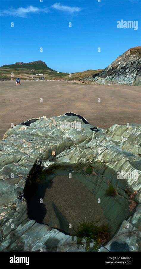 Sea water in a hollowed out rock on the beach at Whitesands Bay on the Pembrokeshire Coast West ...