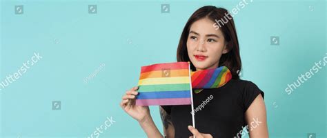 Lgbtq Girl And Pride Flag Sexy Lesbian Girl And Lgbtq Flag Standing Blue Green Background