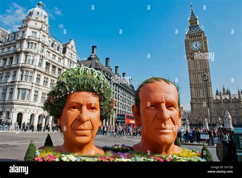 Giant Busts Of The Queen And The Duke Of Edinburgh Are Towed Around