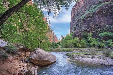 This Natural River Flows Between Two Hills Which Makes The Nature