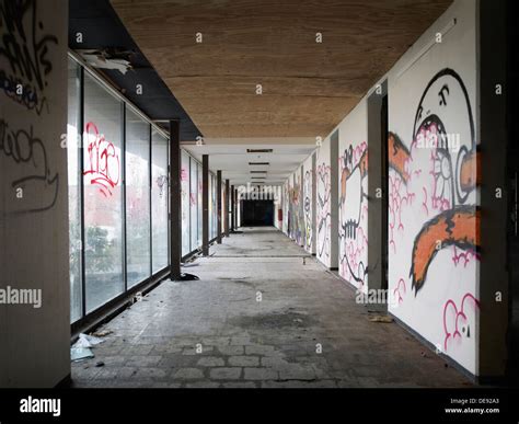 Hallway of Abandoned Building With Graffiti on Walls and Windows Stock ...