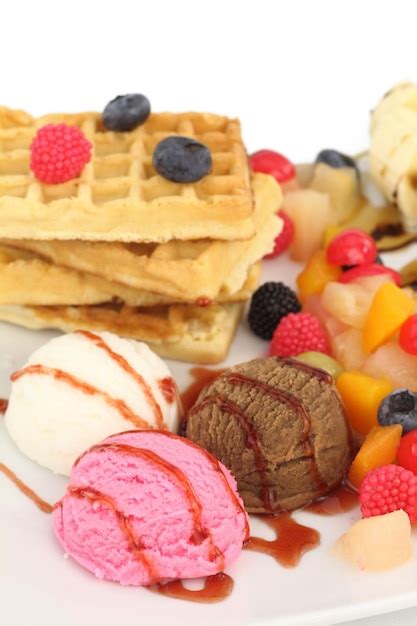 Premium Photo | Waffles with ice cream and fruits