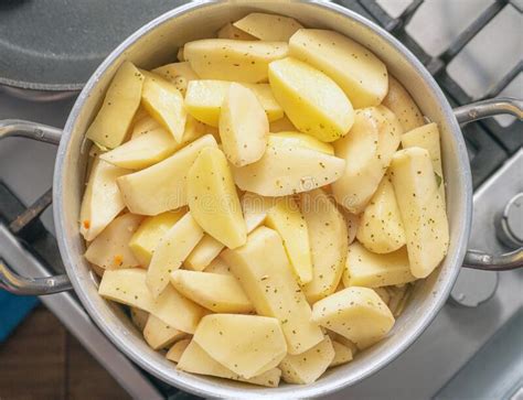 Cooking Potatoes In A Saucepan Top View Cooking Food Peeled Potatoes