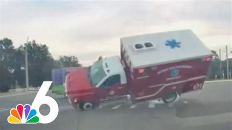 Watch Insane Ambulance Rollover Crash After Being Struck By Bus On