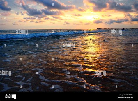 Wave And Sunset Over Sea Beautiful Sunset Foamy Waves Roll Over The