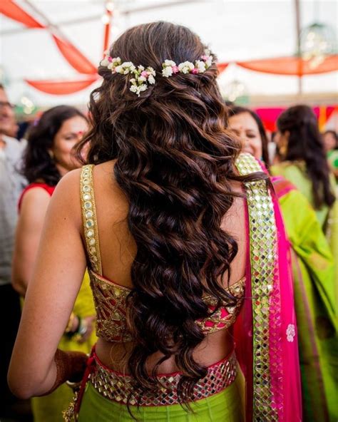 Why Flowers In Open Hair Are The Best Way To Add A Touch Of Glam In