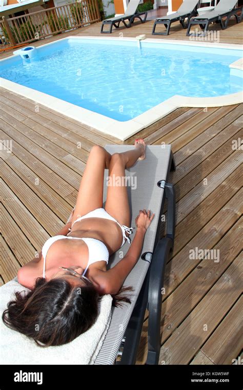Woman Bikini Deckchair Tanning Hi Res Stock Photography And Images Alamy