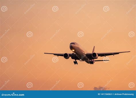 Commercial Airline Passenger Plane Landing At Airport With Beautiful