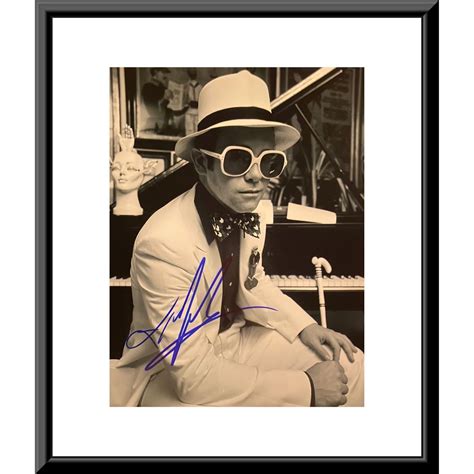 Elton John signed photo | EstateSales.org