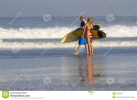 Lovely Couple With Surfboards On Beach Stock Image Image Of Nature