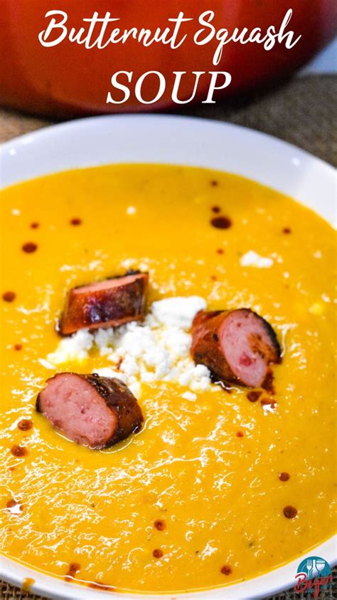 A Bowl Of Butternut Squash Soup With Sausage