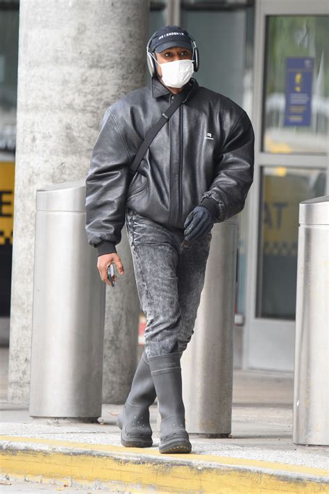 Kanye West spotted wearing creepy white prosthetic mask after changing ...