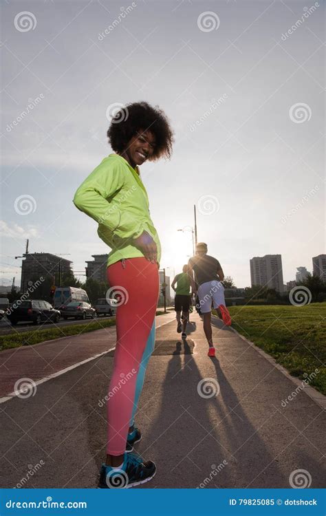 Portrait Of Sporty Young African American Woman Running Outdoors Stock Image Image Of Outdoors