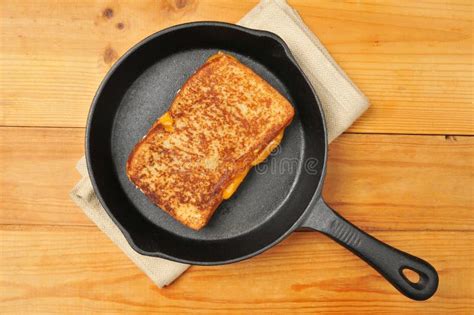 Grilled Cheese Sandwich In Cast Iron Skillet Royalty Free Stock Photos