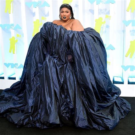 Lizzo Brings The High Fashion Drama In Black Gown And Matching Lipstick