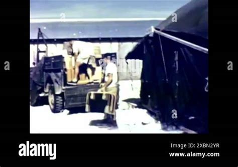 A Firing Party Remains In A Bunker On Enyu Island As Personnel Are Evacuated From Bikini