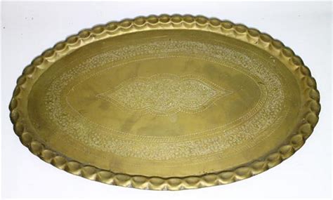 A Large Oval Brass Plate With Frilled Edge And Incised Pattern Emporium Auction Interiors