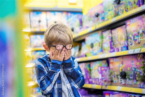 The Little Boy In The Toy Store Is Upset The Kid Covered His Eyes With