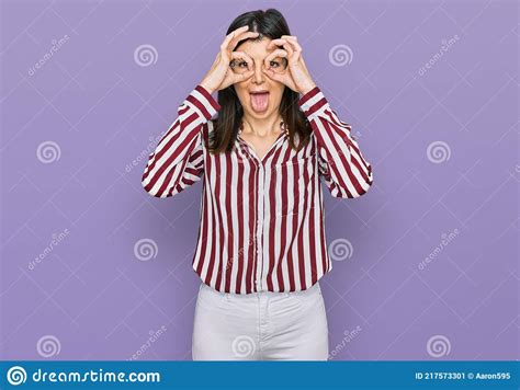 Beautiful Brunette Woman Wearing Striped Shirt Doing Ok Gesture Like