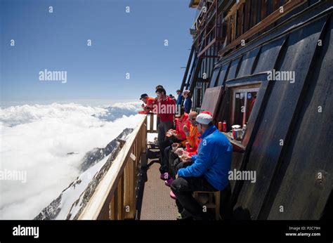 Alpinists In Front Of The Margherita Hut On The Summit Of The 4554