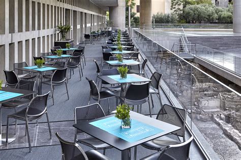 The Acropolis Museum Café overlooks the archaeological excavation © Acropolis Museum. Photo ...