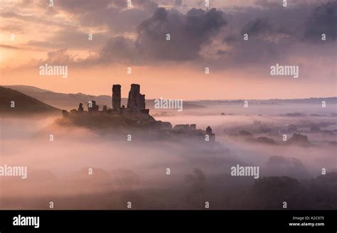 Corfe Castle And Village In Morning Mist Corfe Castle The Purbecks