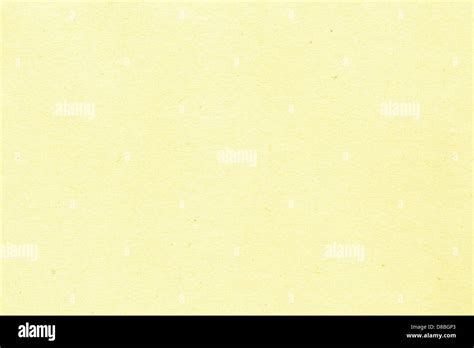 light yellow paper texture with flecks Stock Photo - Alamy