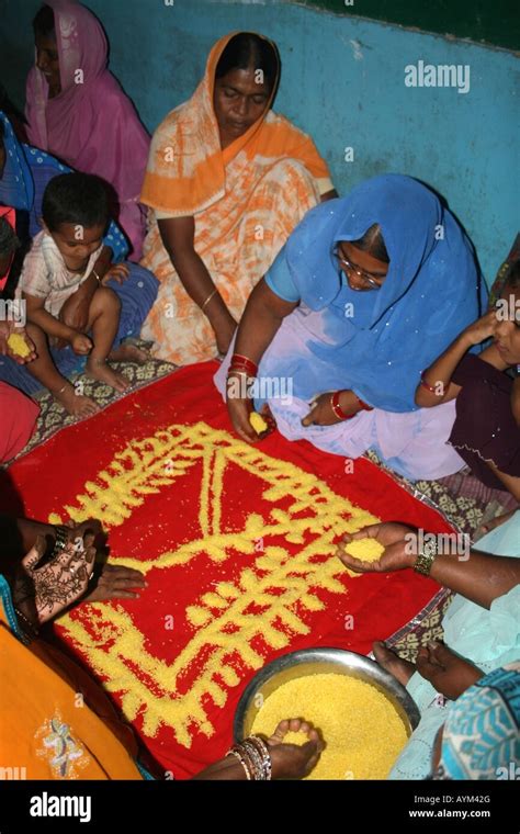 Muslim Women Make Rice Patterns For The Muslim Groom In A Ceremony