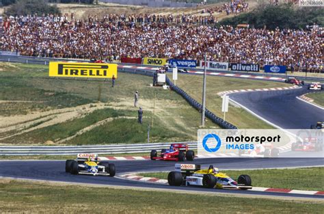 Nigel Mansell Williams FW11 Honda Leads Nelson Piquet Williams FW11