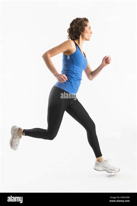 Mature Woman Jogging Cut Out Stock Images Pictures Alamy