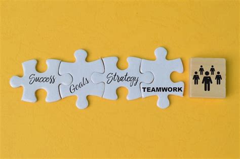 Premium Photo Jigsaw Puzzle With Text SUCCESS GOALS STRATEGY And TEAMWORK