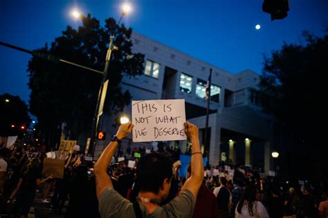 Person Holding A Sign · Free Stock Photo