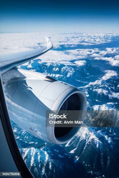 Lufthansa Airbus A350 Wing View While Flying Over Mountains Stock Photo ...