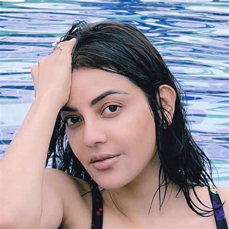 Acharya Actress Kajal Aggarwal Enjoys A Pool Day And Her Bikini Avatar