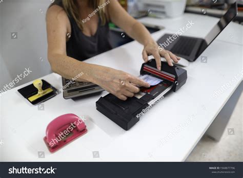 Clear Image Female Hand Inserting Imprinting Stock Photo