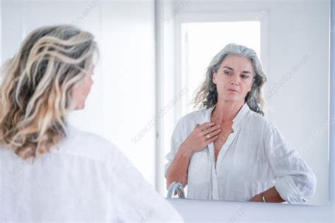 Woman Looking At Herself In A Mirror Stock Image C0507837