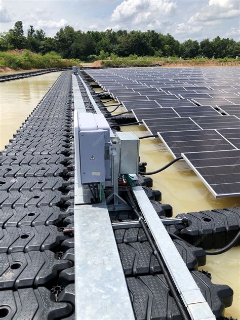 Premium Photo | Floating Photovoltaic Solar Plants Walkway and Inverter