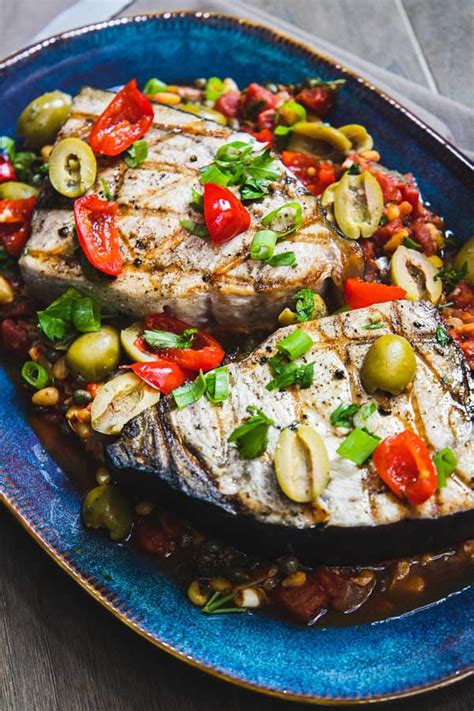 Spicy Mediterranean Swordfish With Tomatoes Olives And Capers Recipe