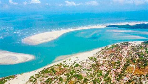 An Aerial View Of The Beach And Lagoons In The Tropical Island Town Of